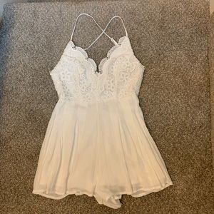 Lulu’s Lacy Open Back Romper